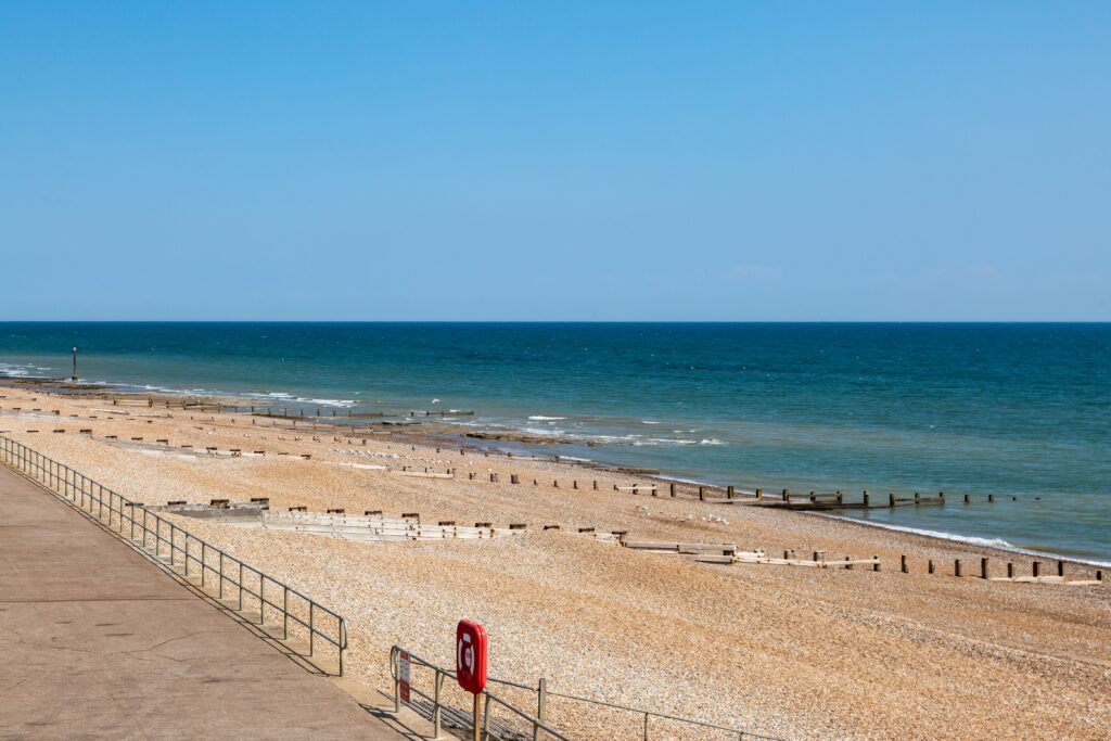Looking,Out,Over,The,Pebble,Beach,At,Bexhill,In,Sussex,